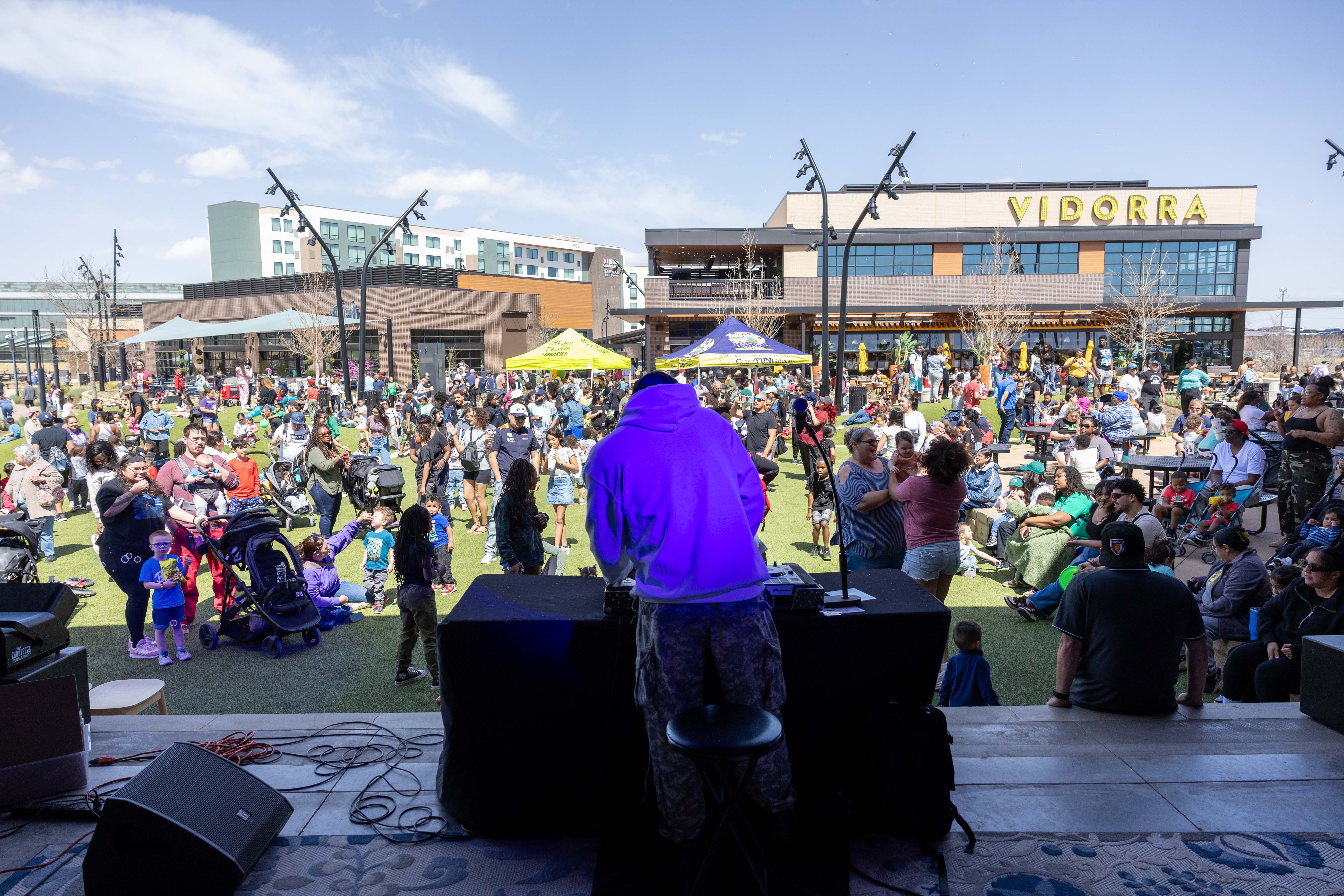 A DJ performing before a crowd